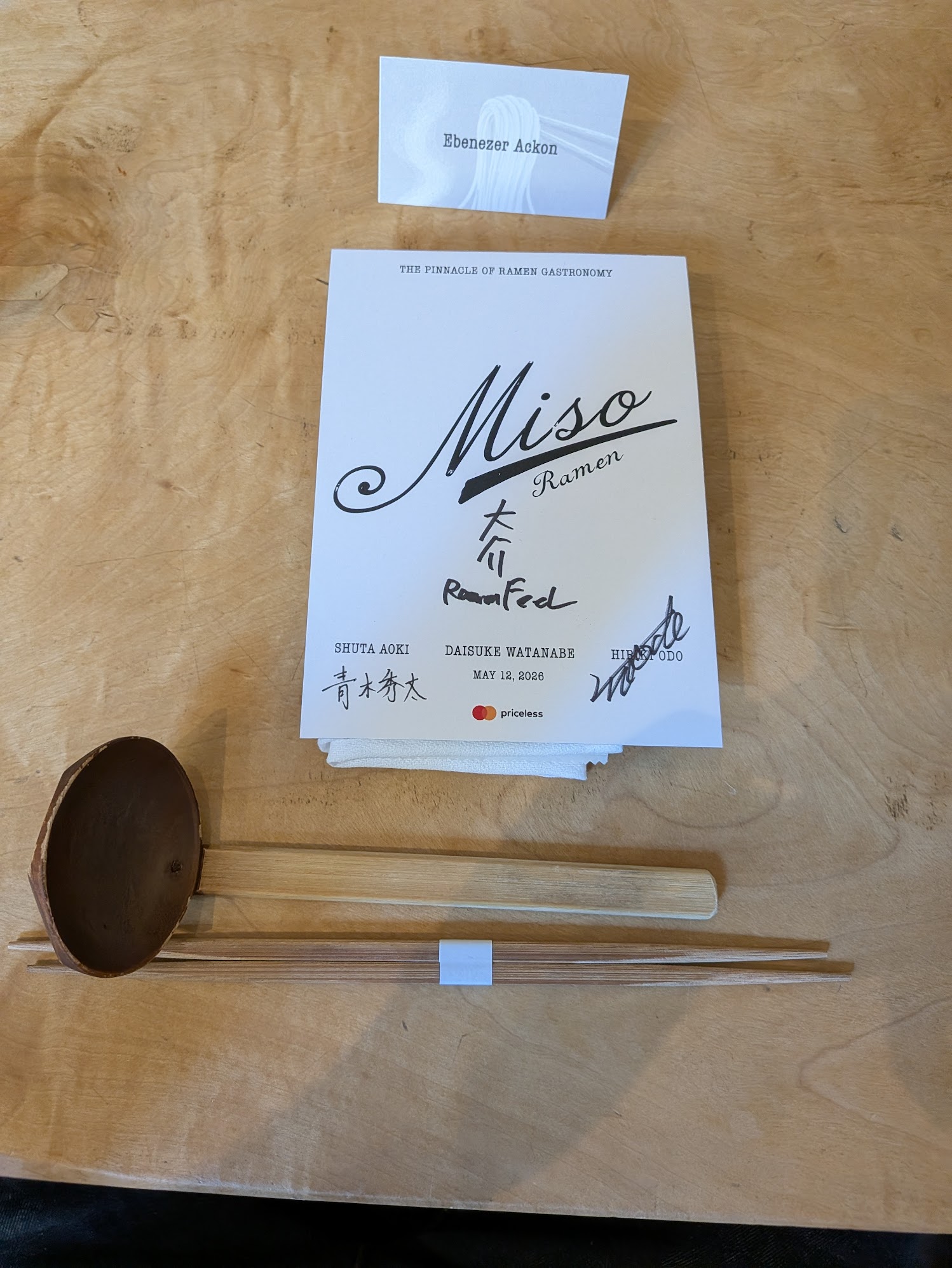 Signed opening day menu and place setting from the Ramen FeeL x Odo launch event