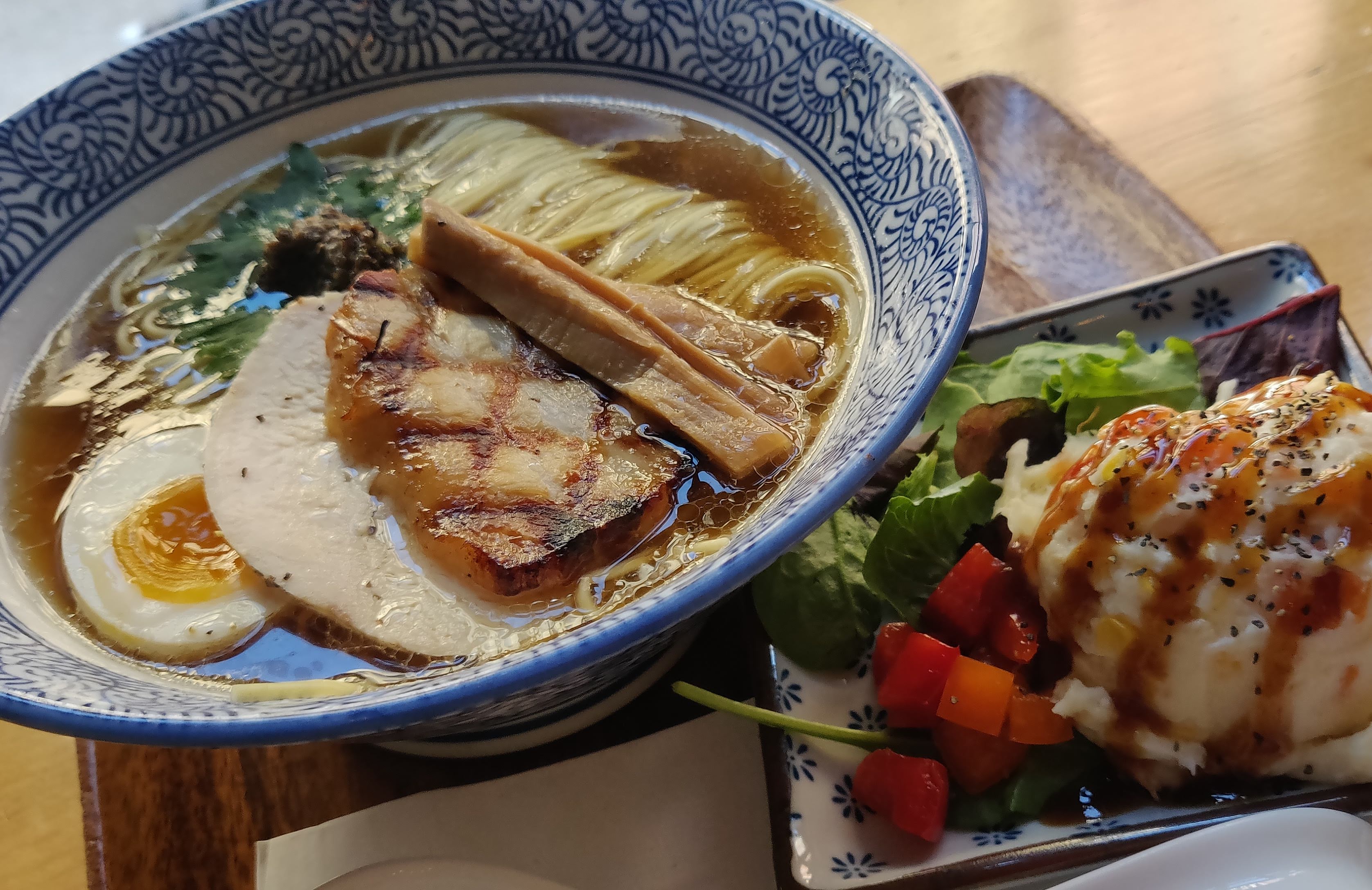 Ramen Ishida’s clear shoyu ramen topped with scallions and menma
