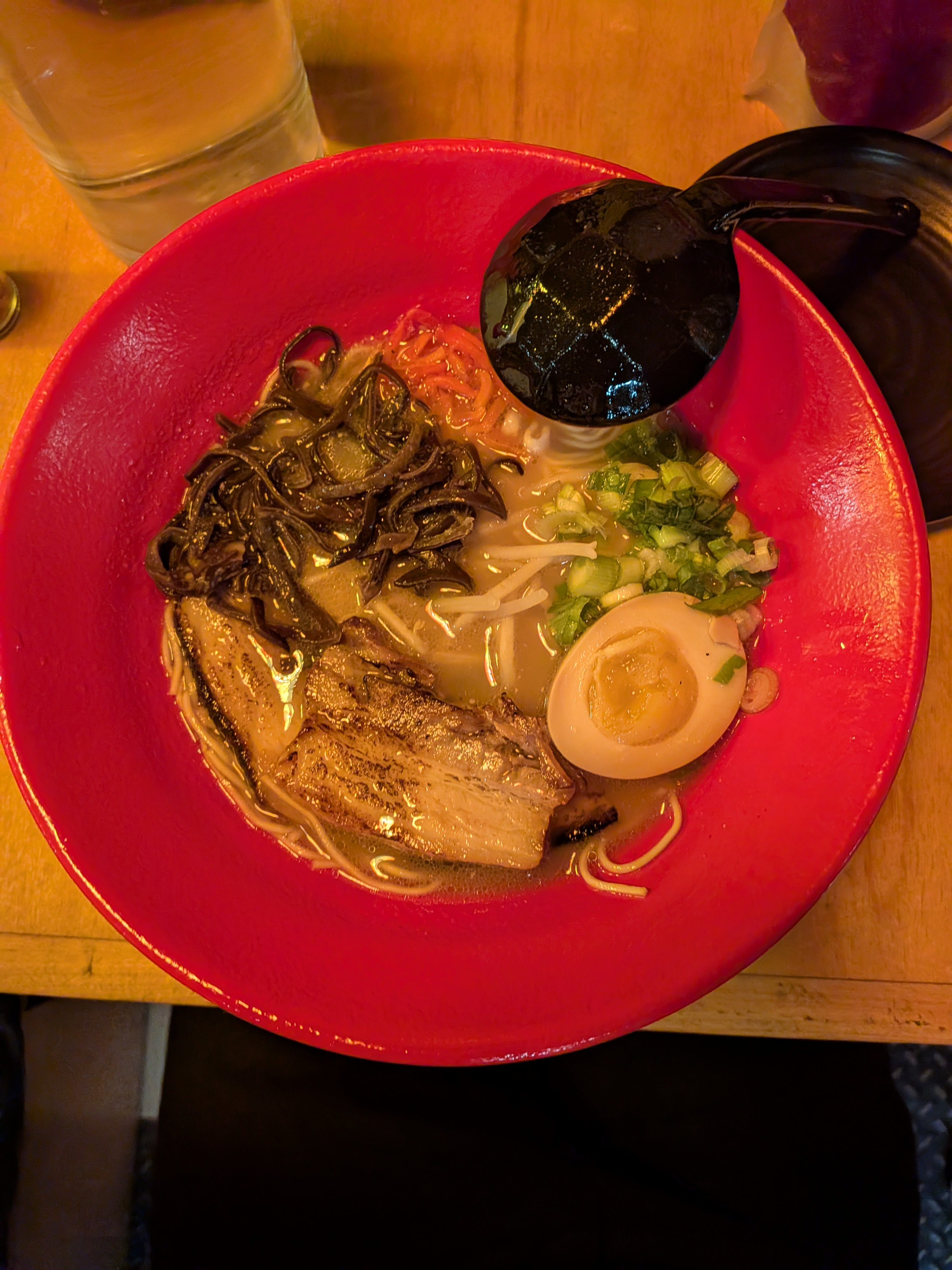 Ramen bowl with bean sprouts and chili powder at Kushi Kushi Yaki